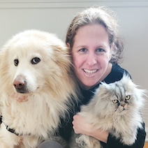 Yael Merbl with a dog and cat