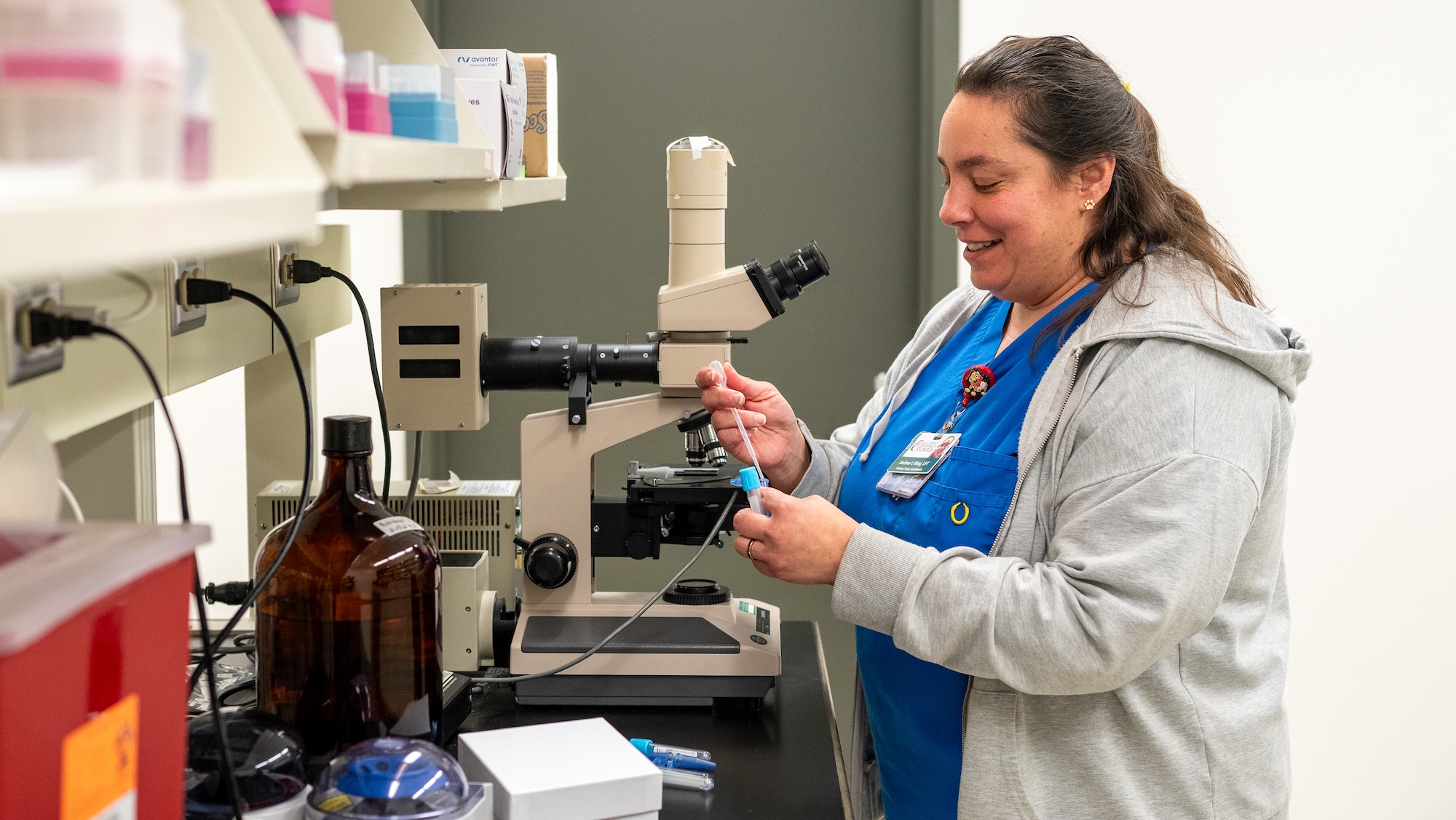 Andrea King at a lab bench in the Clinical Trials Program