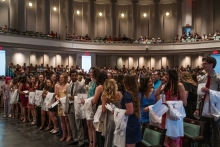 Students waiting in auditorium