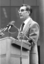 Dean George C. Poppensiek speaking at the lectern. 