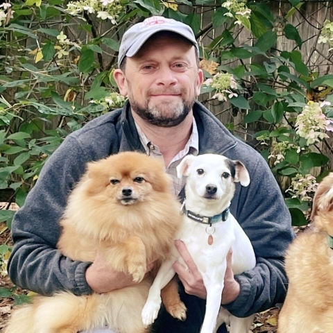 Brian Collins with three dogs