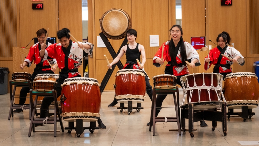 Students playing drum