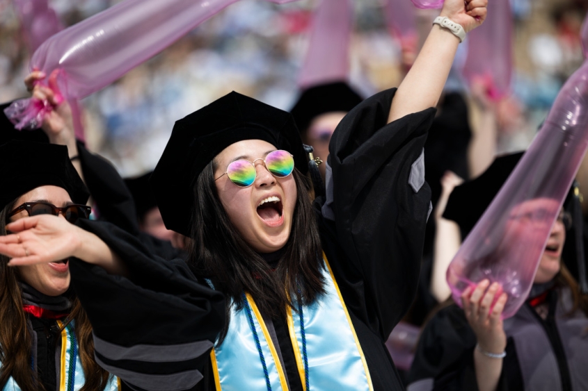 Student jubilating during graduation