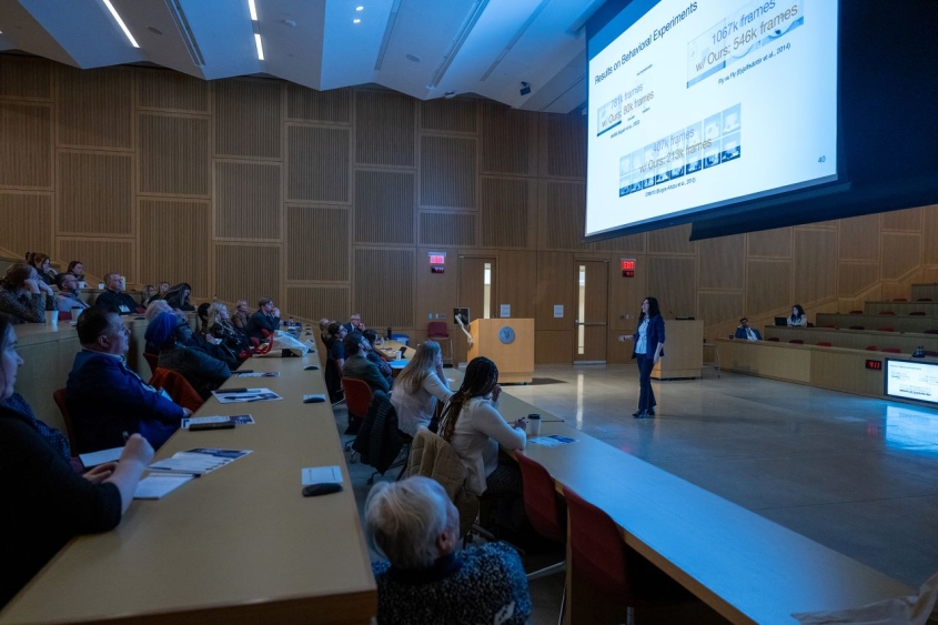 speaker giving talk in lecture hall