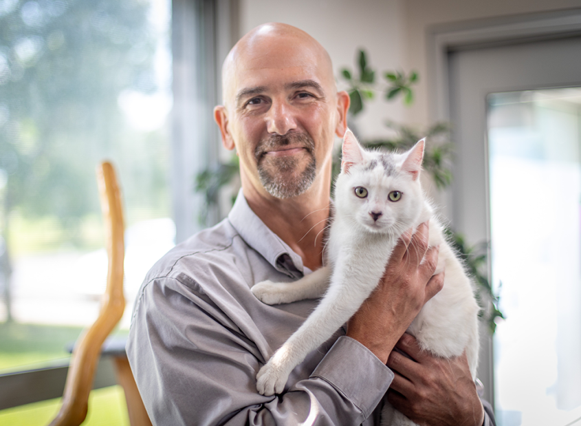 Bruce G. Kornreich holding cat