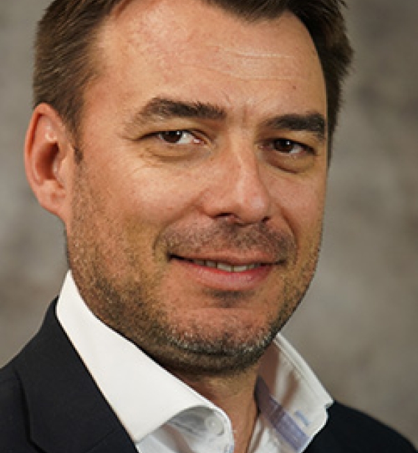 Diego Diel wearing a suit.