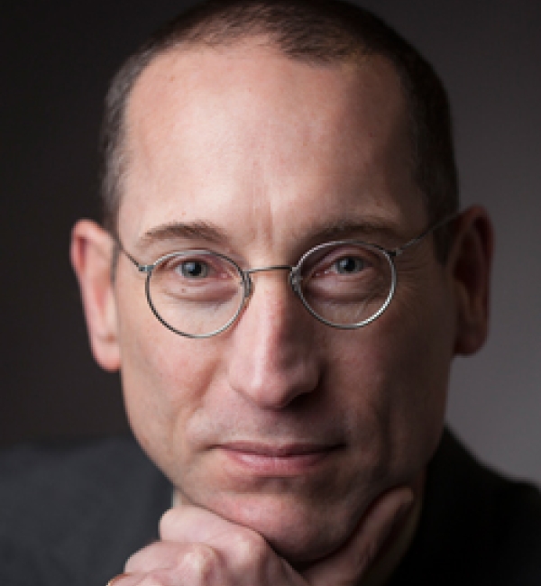 Craig Altier in front of a dark gray backdrop.